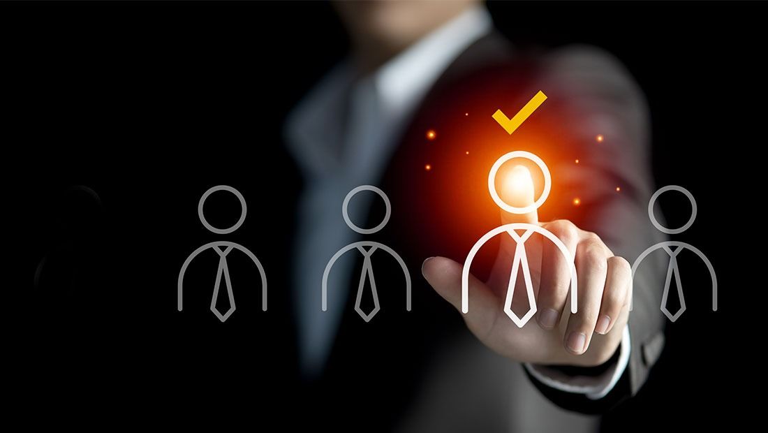 Team of professionals collaborating in an office, representing talent staffing services and recruitment outsourcing services for building high-performing teams